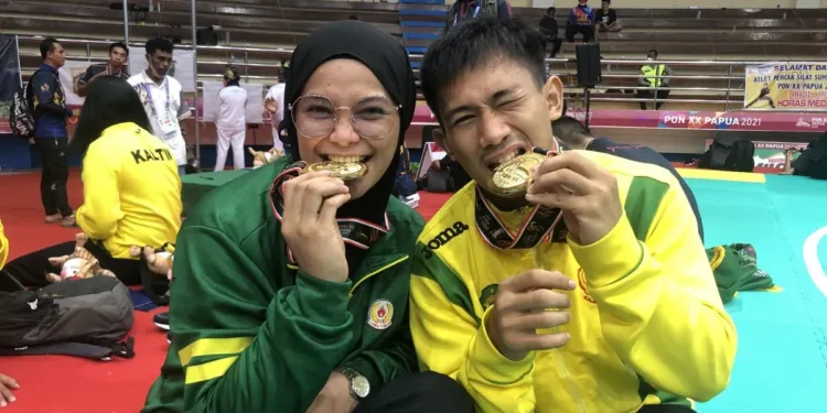 Pasangan Suami Istri Iqbal dan Sarah Raih Medali Emas Pencak Silat di PON XXI Aceh-Sumut