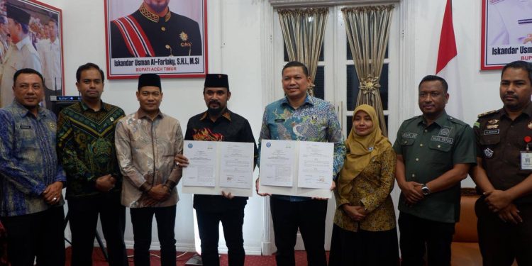 Penandatanganan nota kesepakatan ULT P4GN antara BNNP Aceh dan Pemkab Aceh Timur.